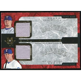 2005 Upper Deck Ultimate Collection Dual Materials #BY Hank Blalock/Michael Young Jersey /15