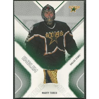 2002/03 Between the Pipes #19 Marty Turco Emblem /10
