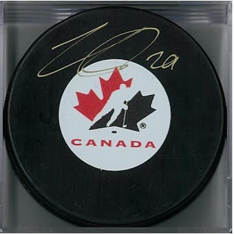 Nathan MacKinnon Autographed Team Canada Puck (Frameworth COA)