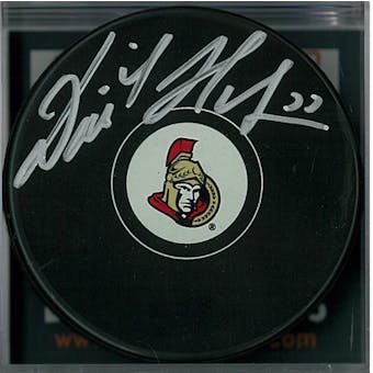 Dominik Hasek Autographed Ottawa Senators Hockey Puck (DACW COA)