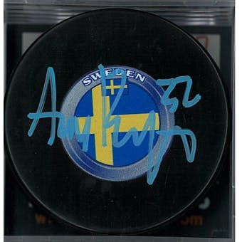Adam Boqvist Autographed Team Sweden Hockey Puck (DACW COA)