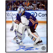 Devon Levi Autographed Buffalo Sabres 8x10 Blue Jersey Hockey Photo