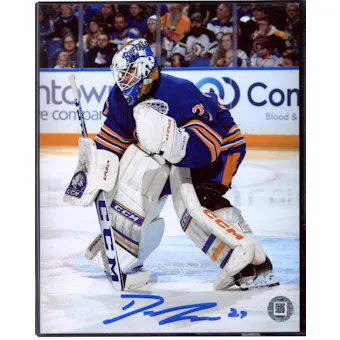 Devon Levi Autographed Buffalo Sabres 8x10 Blue Jersey Hockey Photo