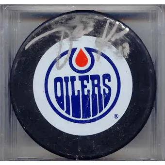 Jari Kurri Autographed Edmonton Oilers Hockey Puck (Smudged)